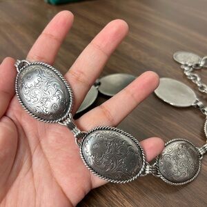 women’s silver colored metal floral western concho chain belt